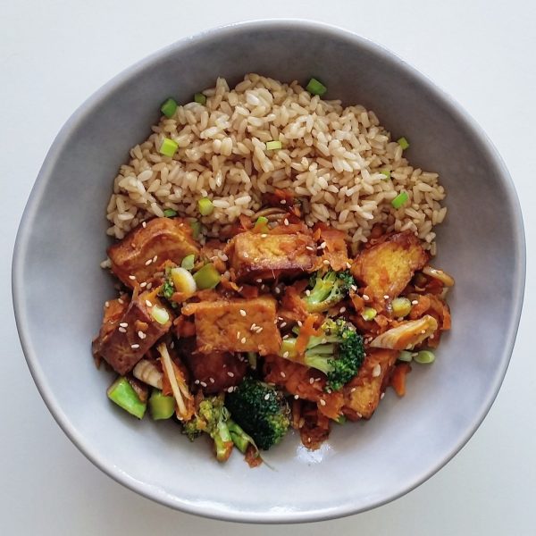 Crispy tofu stir fry with a glaze made from miso paste and agave nectar