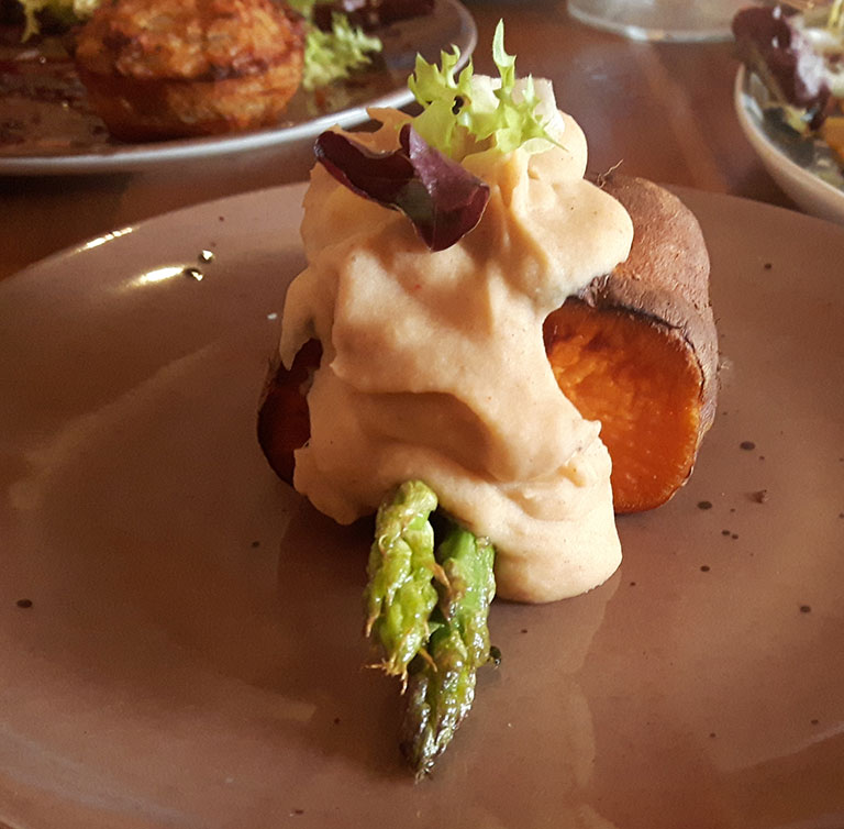 Baked sweet potato with asparagus and butter bean hummus, 